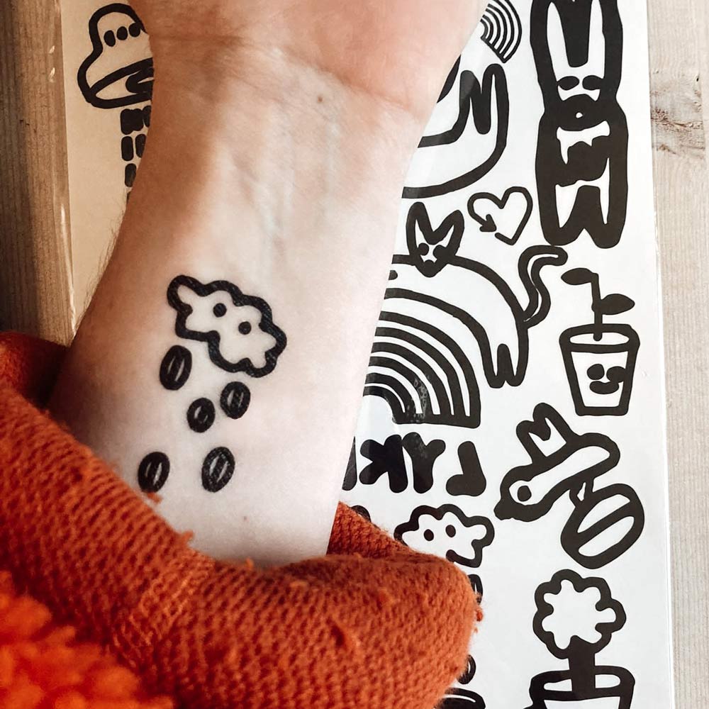 Lykke Gnuggis – Temporary tattoos - Lykke Kaffegårdar  Edit alt text
