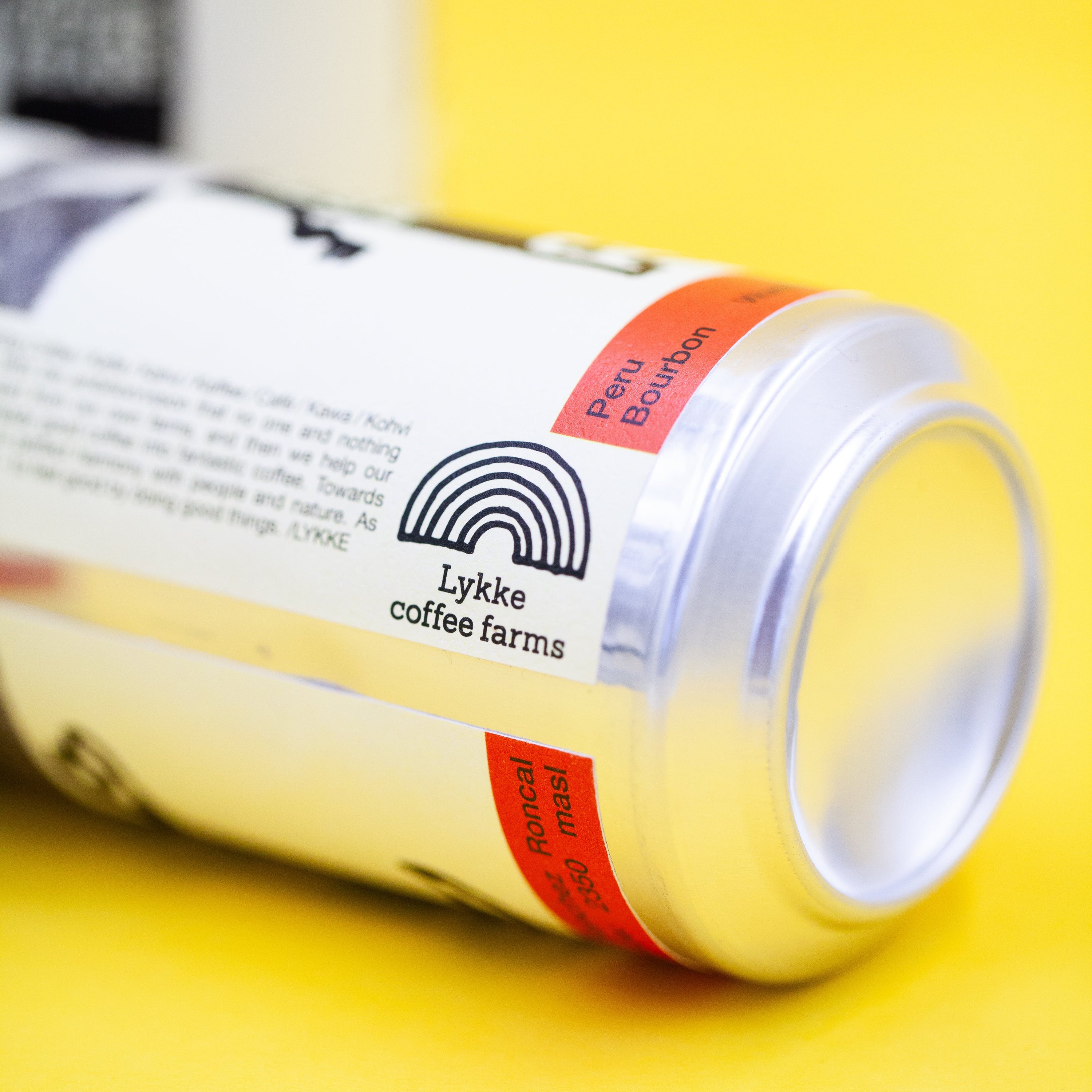 Can of Lykke coffee farms on a yellow background